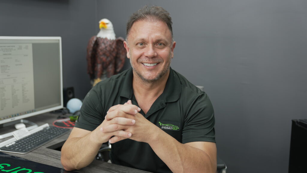 Oliver owner of Primo Paint & Body Shop, in Pompano Beach, FL